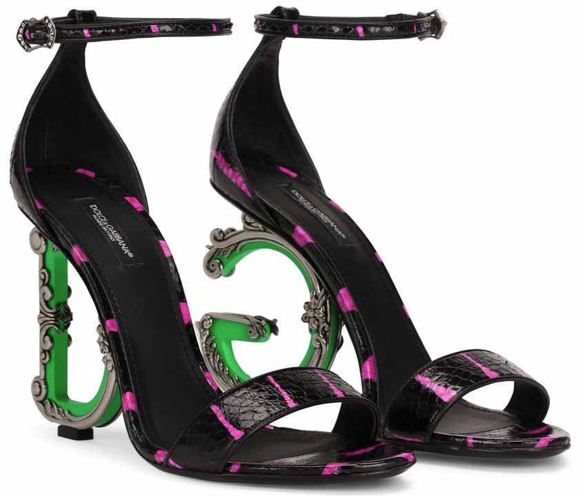 Made from printed Elaphe, these Dolce Gabbana sandals are defined by the sculptural baroque DG heels with neon trims