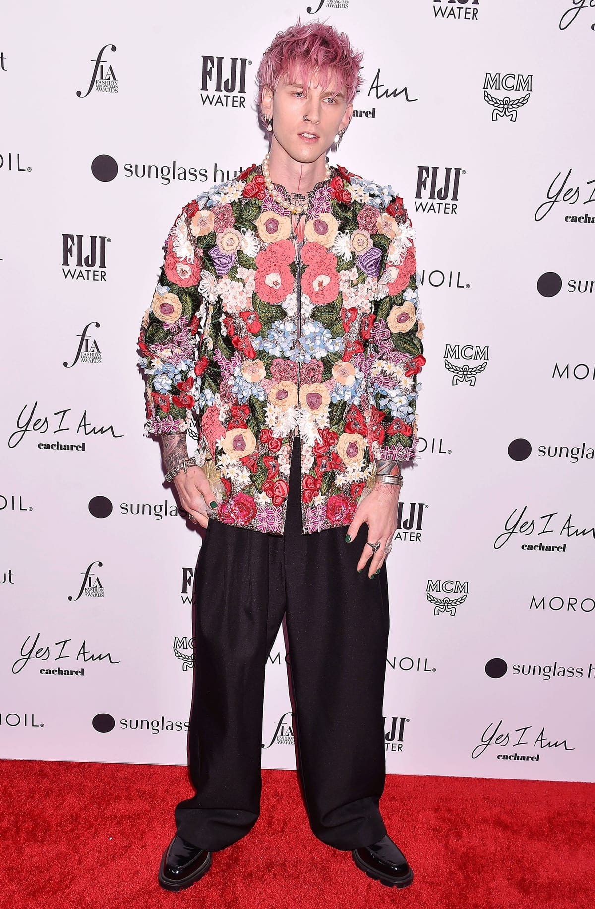 Machine Gun Kelly in a floral Dolce Gabbana jacket at The Daily Front Row's 6th Annual Fashion Los Angeles Awards