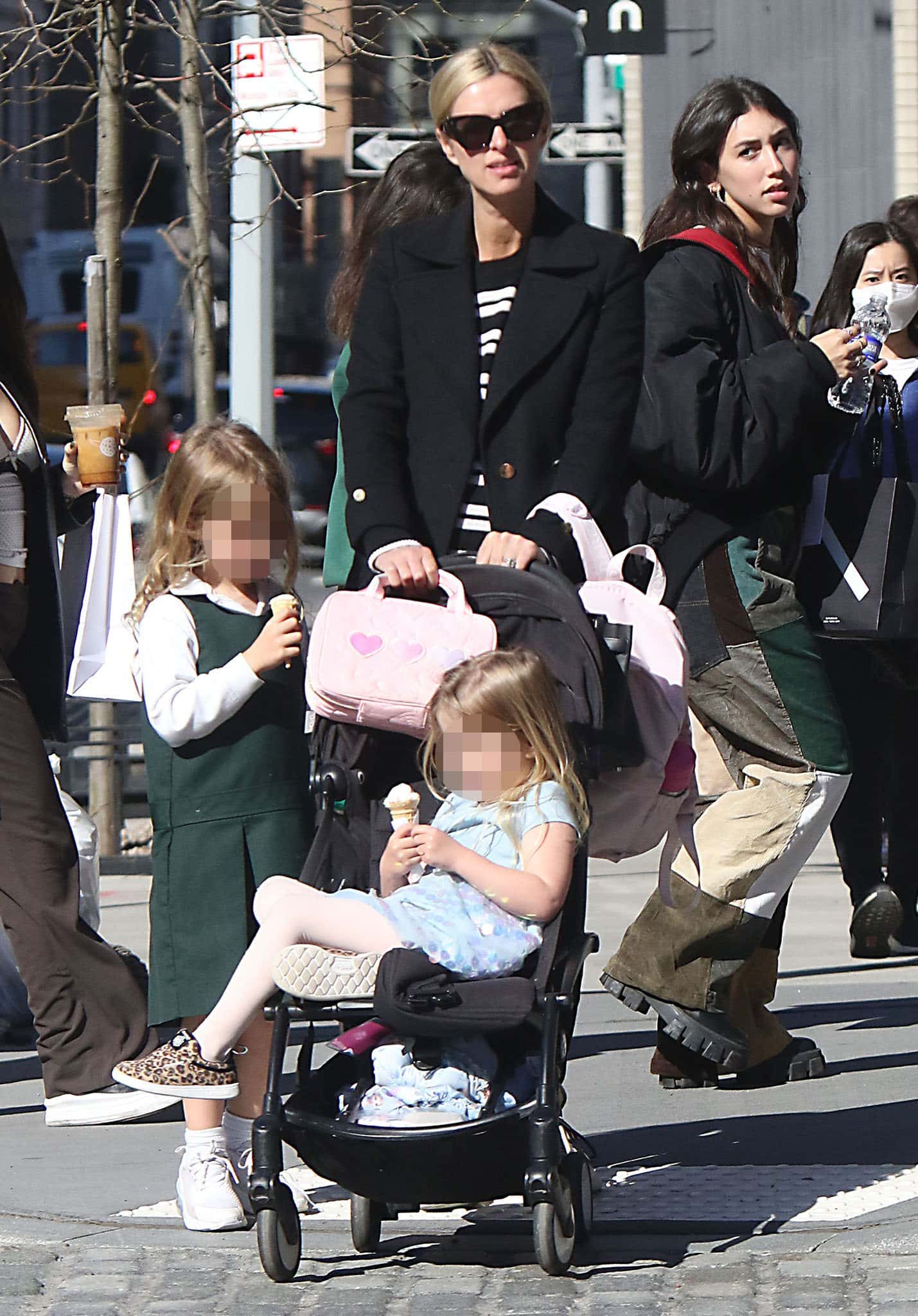 Nicky Hilton steps out in Soho with her daughters Lily and Teddy, combining chic maternity fashion with family fun