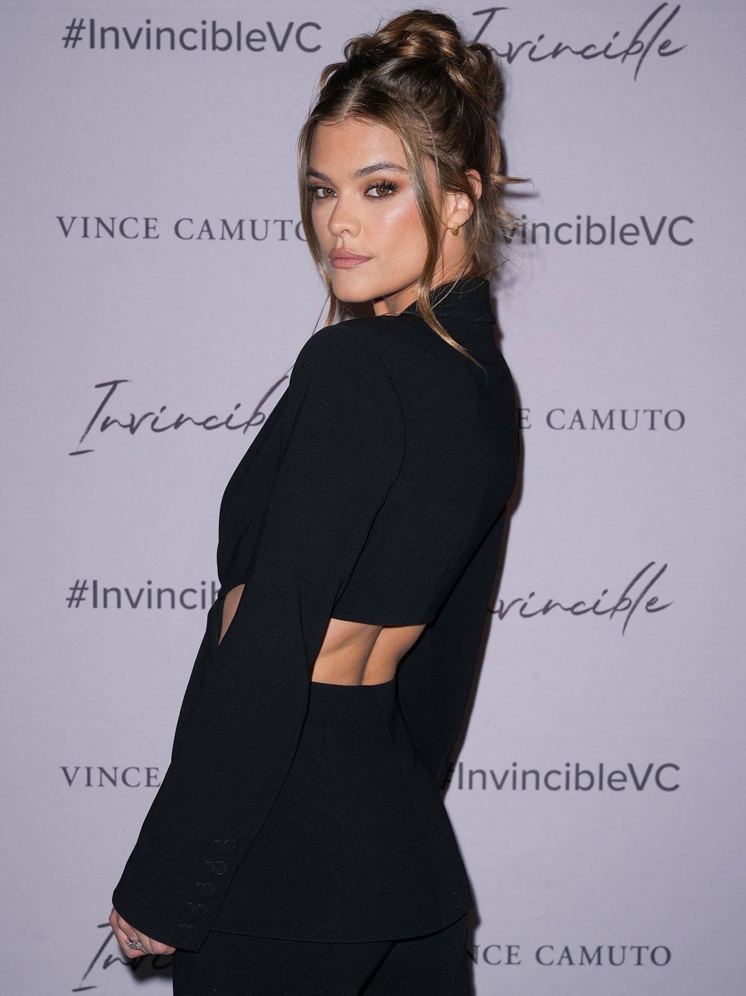 Side cutouts wrapping toward the back give Nina Agdal's structured blazer an unexpected architectural silhouette