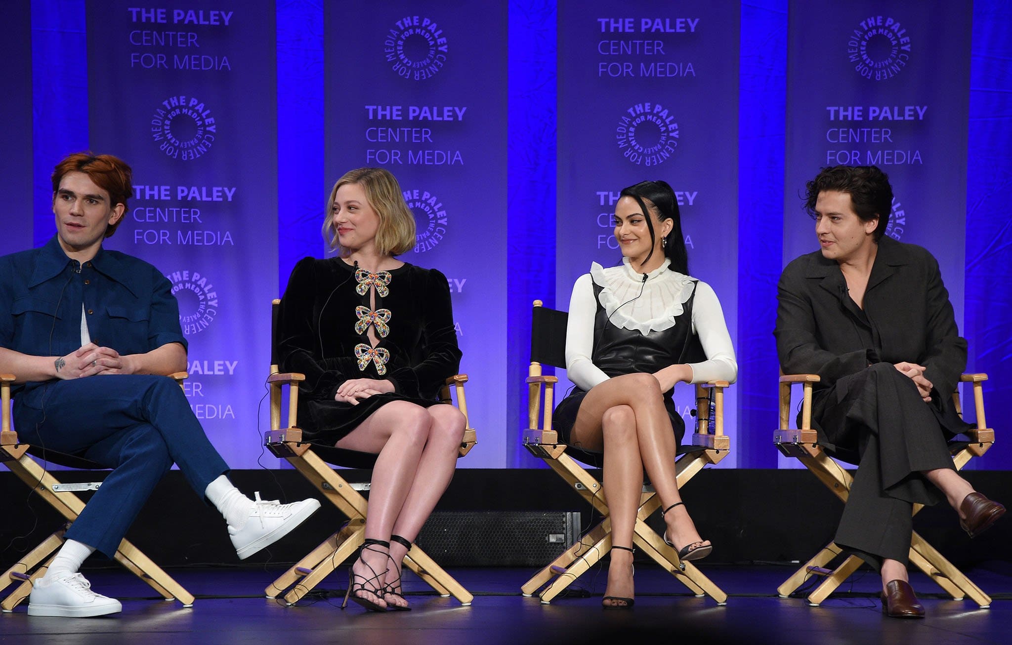 The Riverdale cast appears at the 2022 PaleyFest panel at the Dolby Theatre on April 9, 2022, showcasing polished looks and designer footwear
