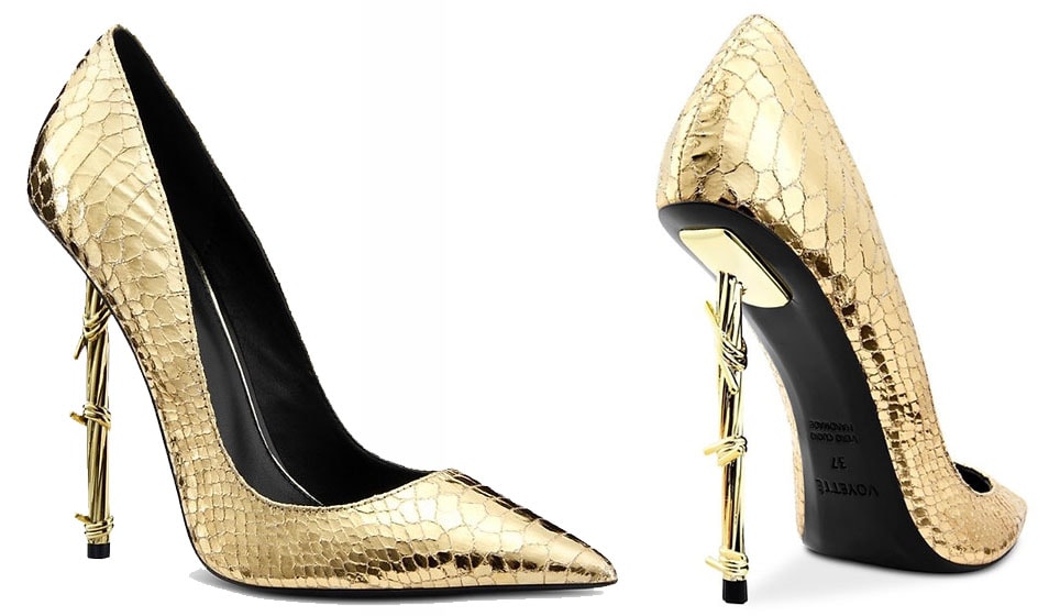 These Voyette ‘Sky-J’ pumps are crafted from metallic gold faux snake and feature a barbed wire heel