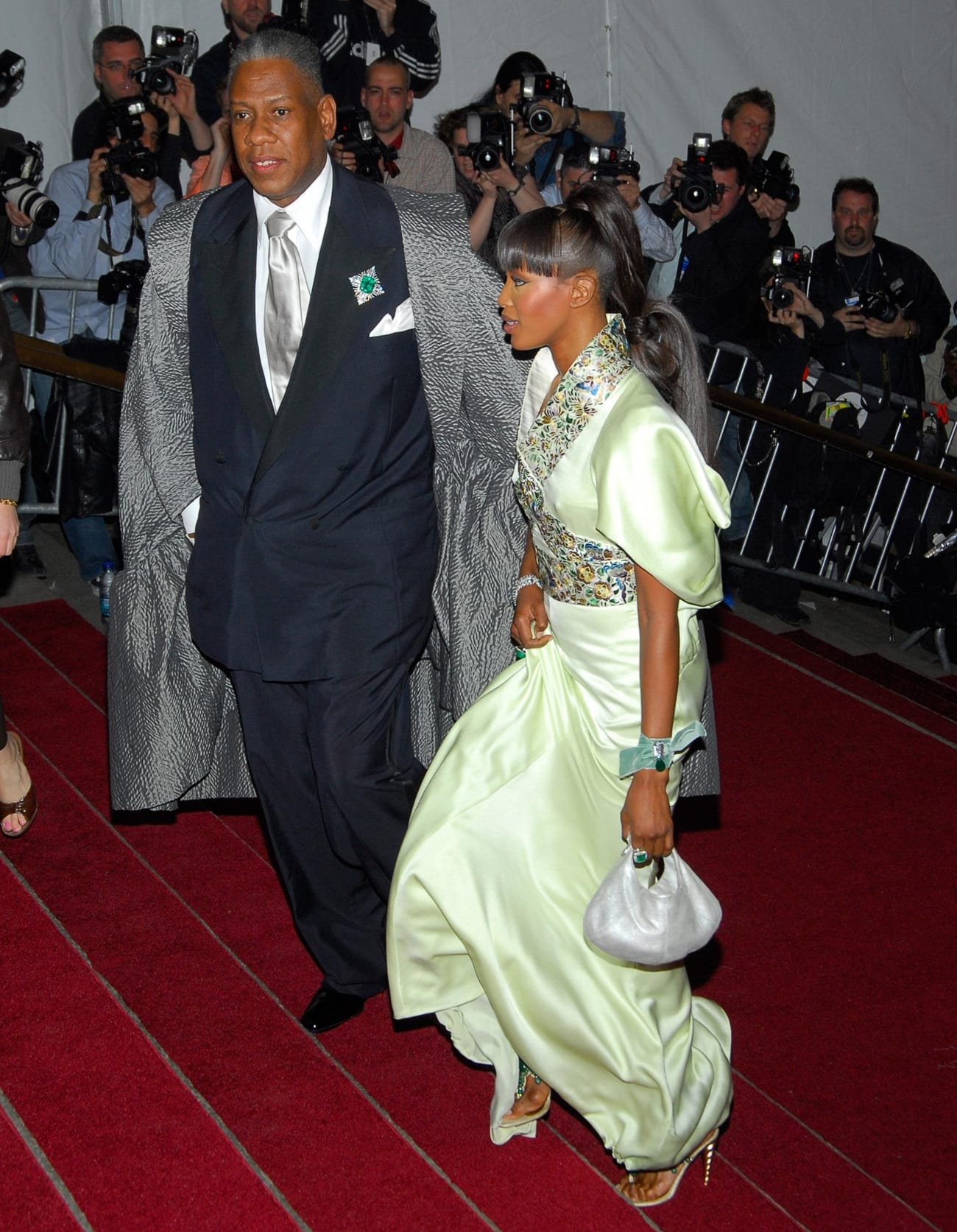 American fashion journalist André Leon Talley arrives with Naomi Campbell at the AngloMania: Tradition and Transgression in British Fashion opening gala at The Metropolitan Museum of Art in New York City on May 1, 2006, as Campbell paired a pale green embellished gown with metallic strappy sandals and coordinating emerald jewelry