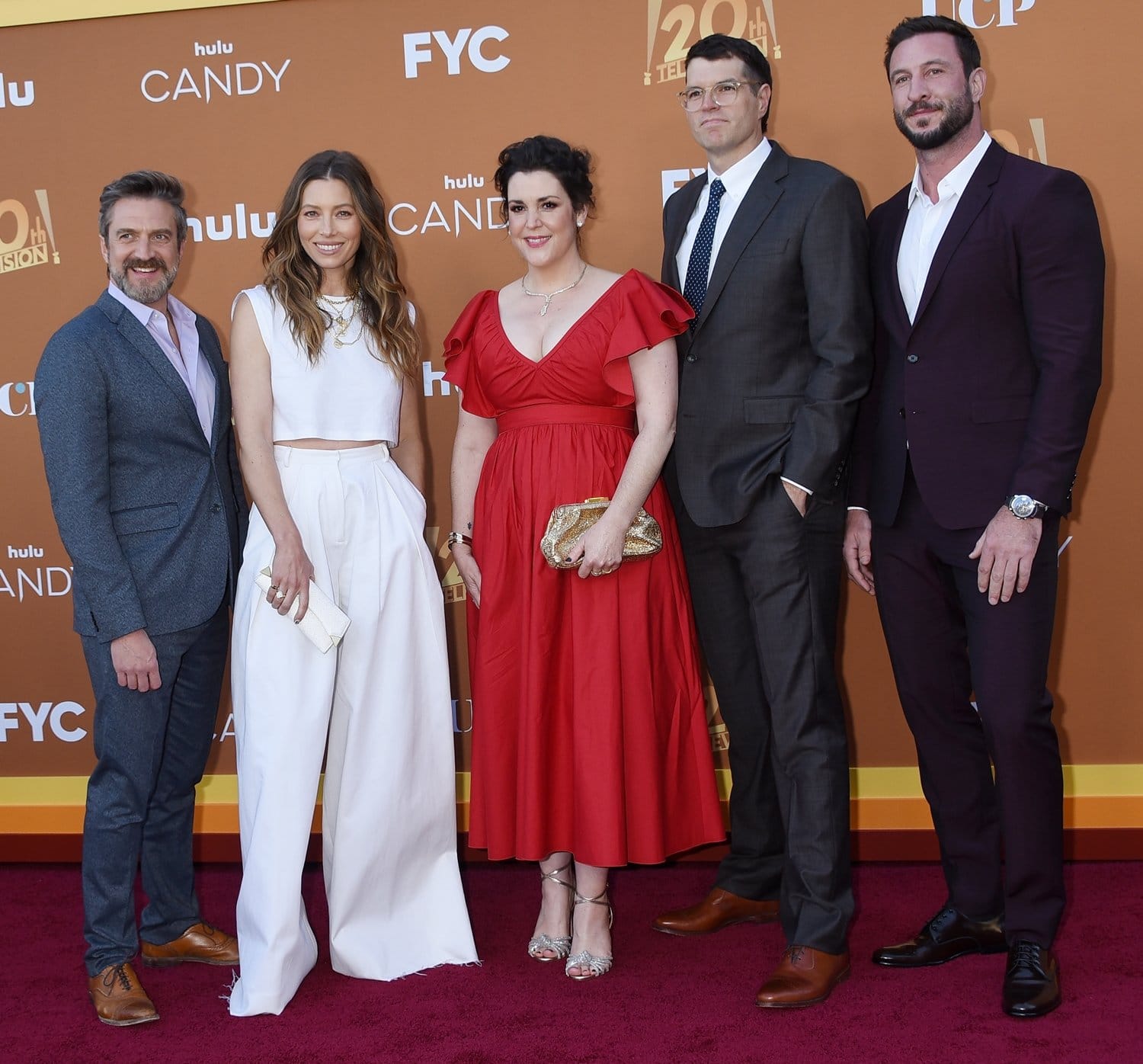Candy cast members Timothy Simons, Jessica Biel, Melanie Lynskey, Raúl Esparza, and Pablo Schreiber step out in a mix of polished footwear—from Biel’s floor-grazing Giambattista Valli trousers that conceal her shoes to Lynskey’s glittering strappy sandals, while the men ground their tailored suiting with classic leather dress shoes in rich brown and black finishes