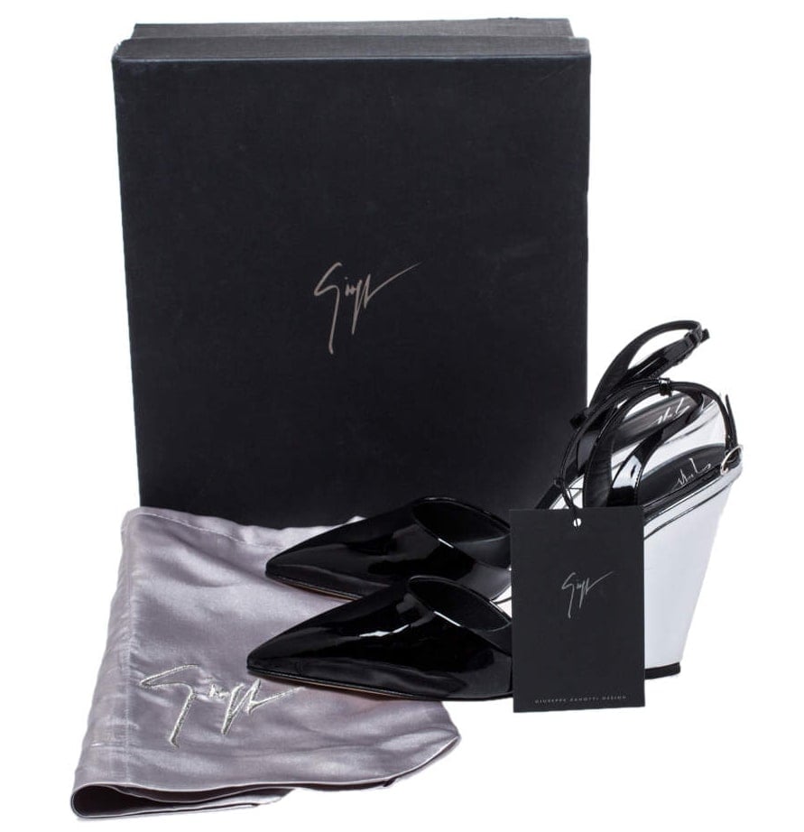 Giuseppe Zanotti shoes come in a black box with a silver logo and a silky silver dust bag