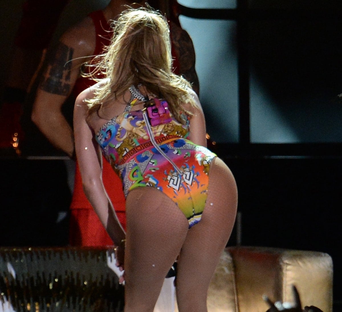 Jennifer Lopez turns heads in a vibrant, printed bodysuit while performing at the iHeartRadio Ultimate Pool Party at Fontainebleau Miami Beach, showcasing her signature blend of confidence, color, and stage-ready style