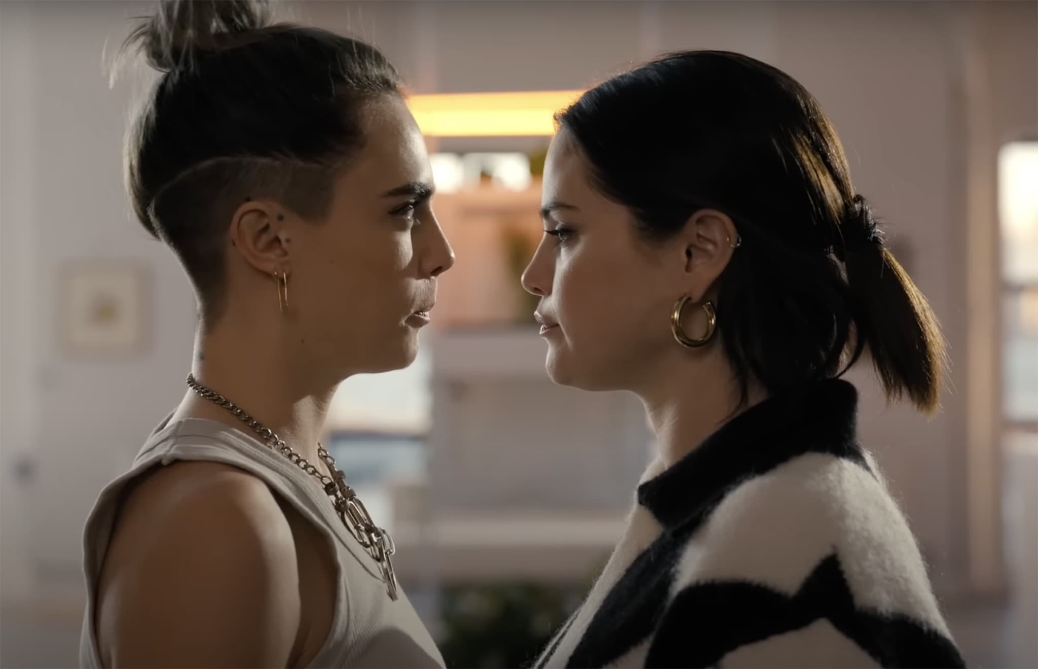 Cara Delevingne and Selena Gomez lock eyes before their much-talked-about kiss in Only Murders in the Building season two, a moment that sparked debate among fans for its intentionally “awkward” delivery