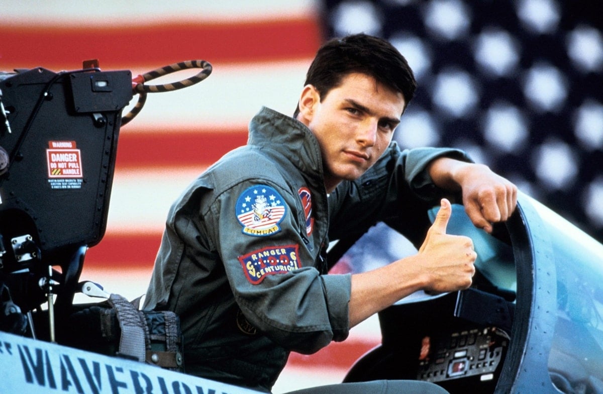 Tom Cruise wears a leather G-1 jacket as LT Pete "Maverick" Mitchell in the 1986 American action drama film Top Gun