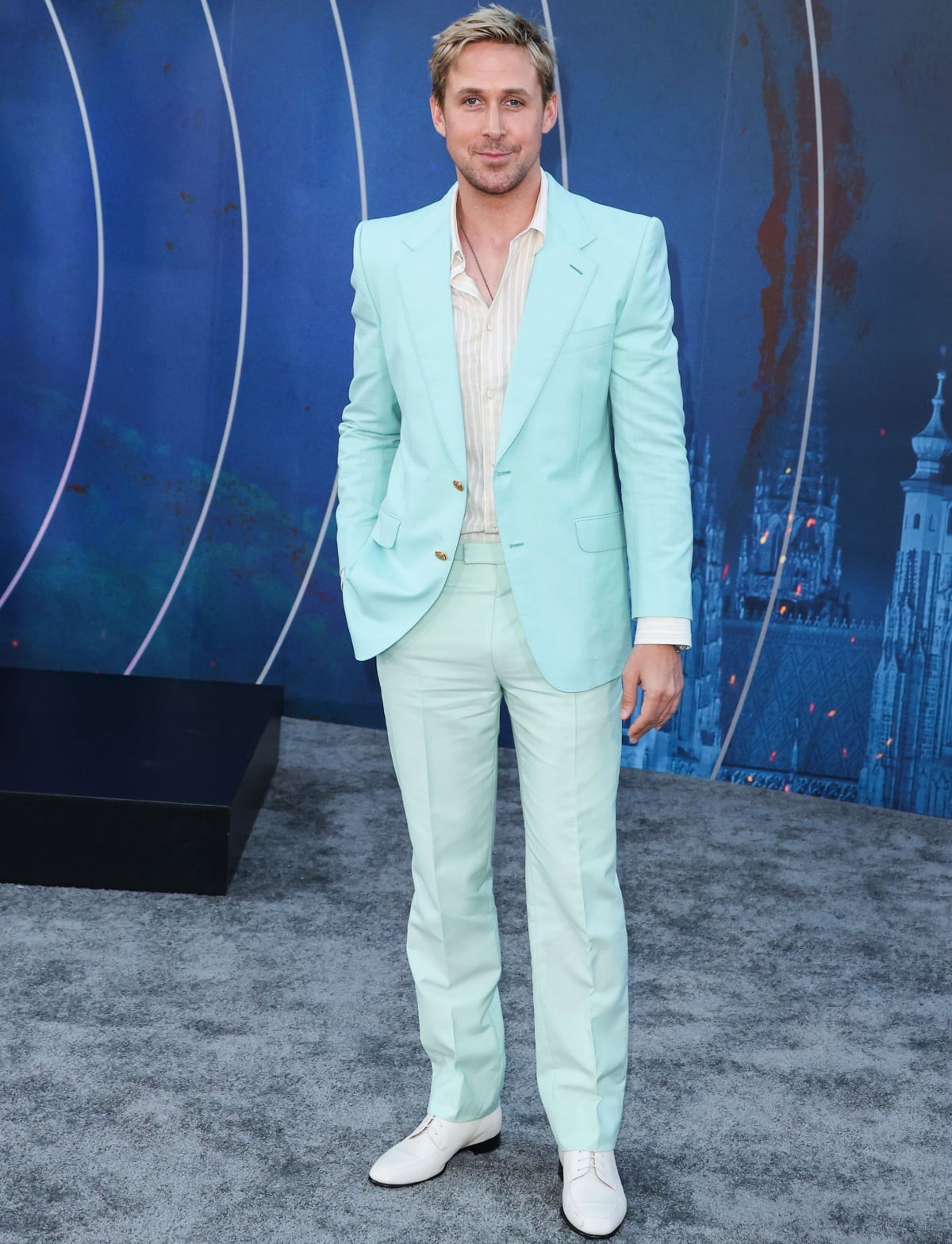 Ryan Gosling brings a softer take to premiere suiting in a seafoam Gucci ensemble, pairing the pastel tailoring with a cream striped shirt and polished ivory leather brogues