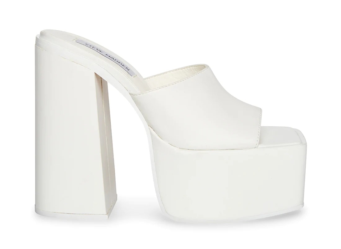Elevate your look with these Steve Madden Trixie mules that have 2-inch platforms and 6-inch block heels