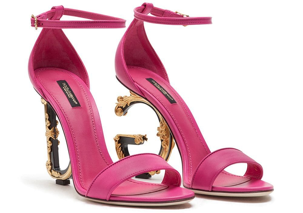 Done in shocking pink, the Dolce Gabbana Keira boasts the house's signature baroque sculpted heels