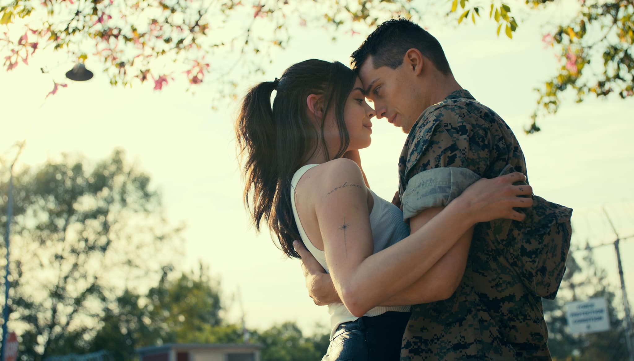 Sofia Carson and Nicholas Galitzine share an intimate moment in Purple Hearts, a project director Liz Allen first approached Carson about while she was filming in Portland five years earlier