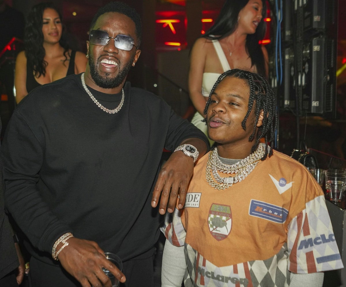Standing at 5'10", Sean Combs (a.k.a. Puff Daddy) visibly towers over the 5'1" rapper 42 Dugg, highlighting their striking height difference as they enjoy a night out in style