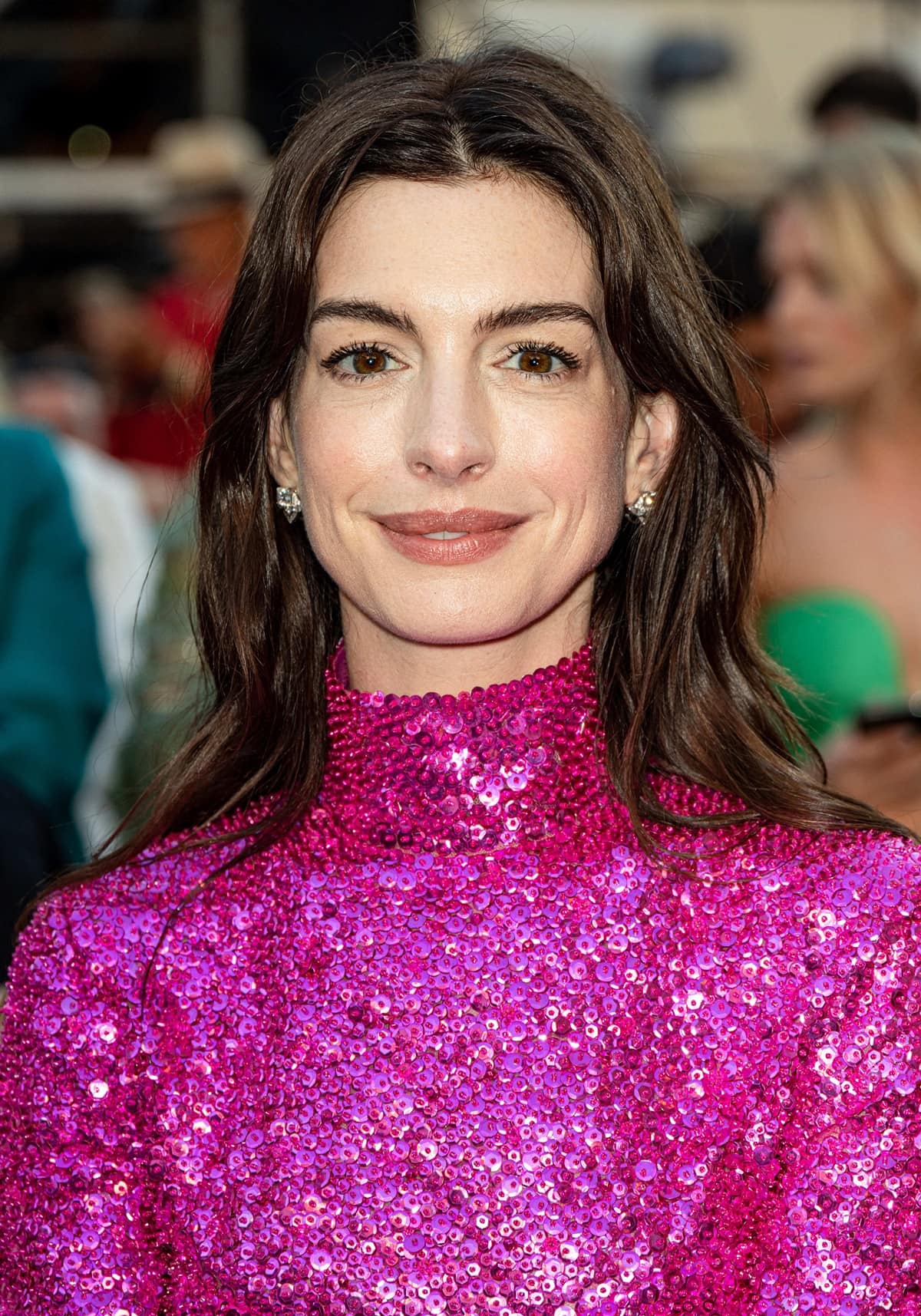 Anne Hathaway embraced the Barbiecore trend at the Valentino haute couture Fall/Winter 22/23 fashion show