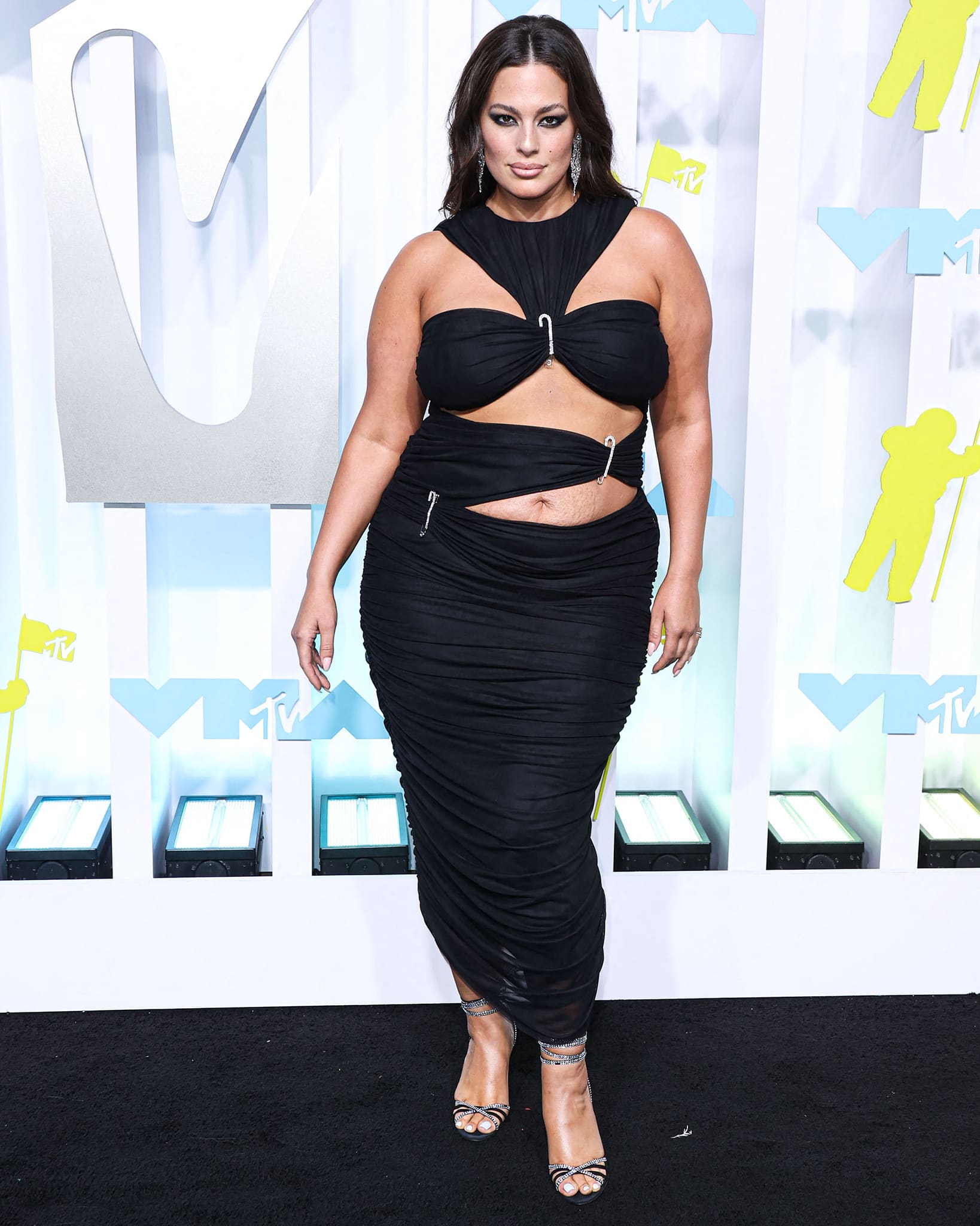 Ashley Graham flaunts her stretch marks in a Houghton by Katharine Polk black cutout dress