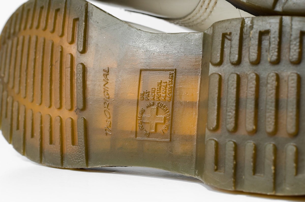 Genuine markings: Check for 'The Original', 'Air Cushion Sole', and resistance claims on Dr. Martens' outsoles