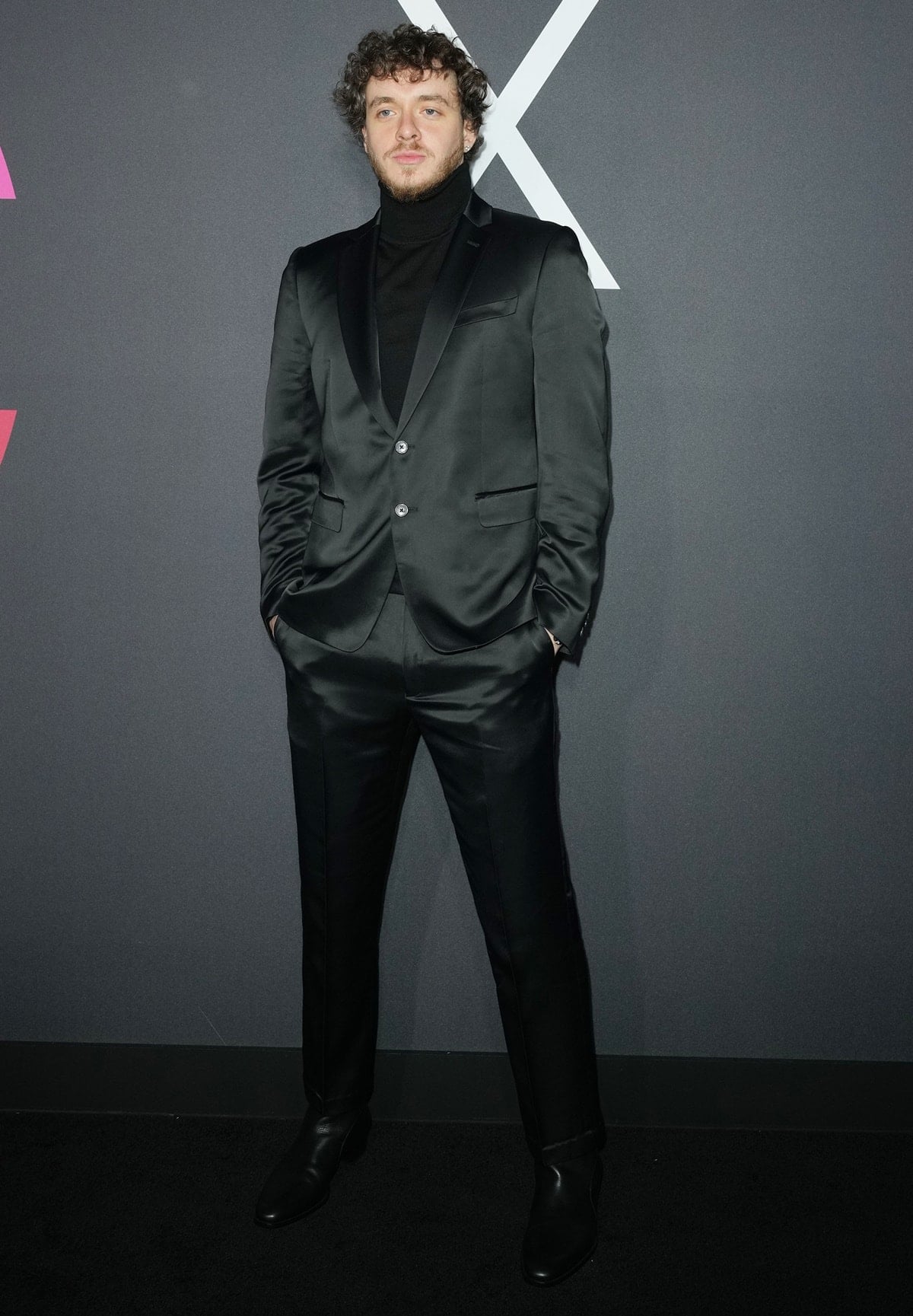 Jack Harlow suits up in sleek black at Harper's BAZAAR Global ICONS Portfolio and Bloomingdale's 150th Anniversary celebration in New York City on September 9, 2022