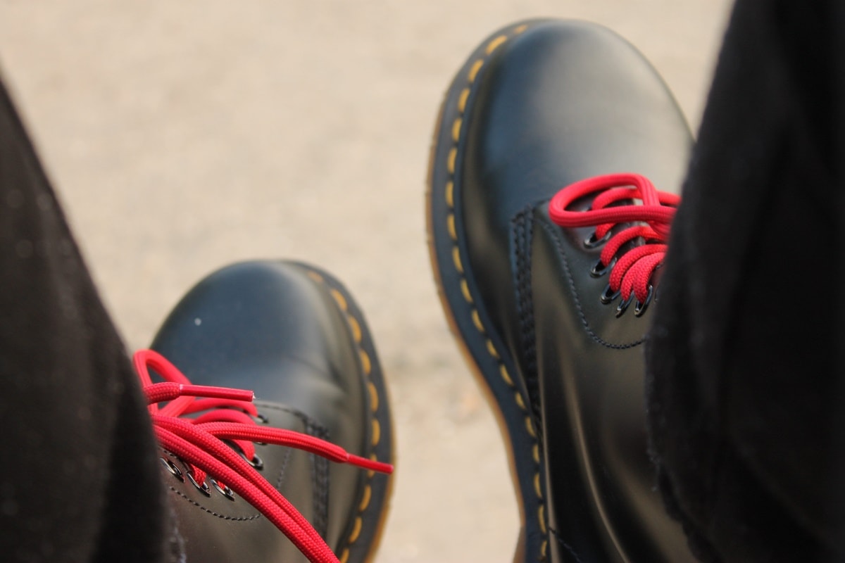 Dr. Martens fit true to size and should feel tight, but not uncomfortable