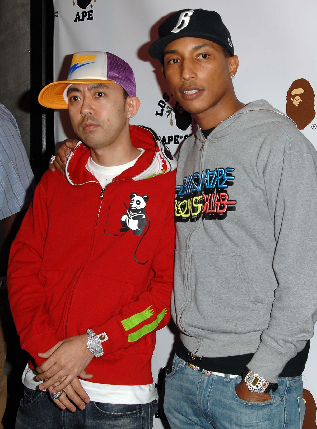 BAPE founder and now Kenzo creative director Nigo with Pharrell Williams at the Los Angeles BAPE store opening in 2008
