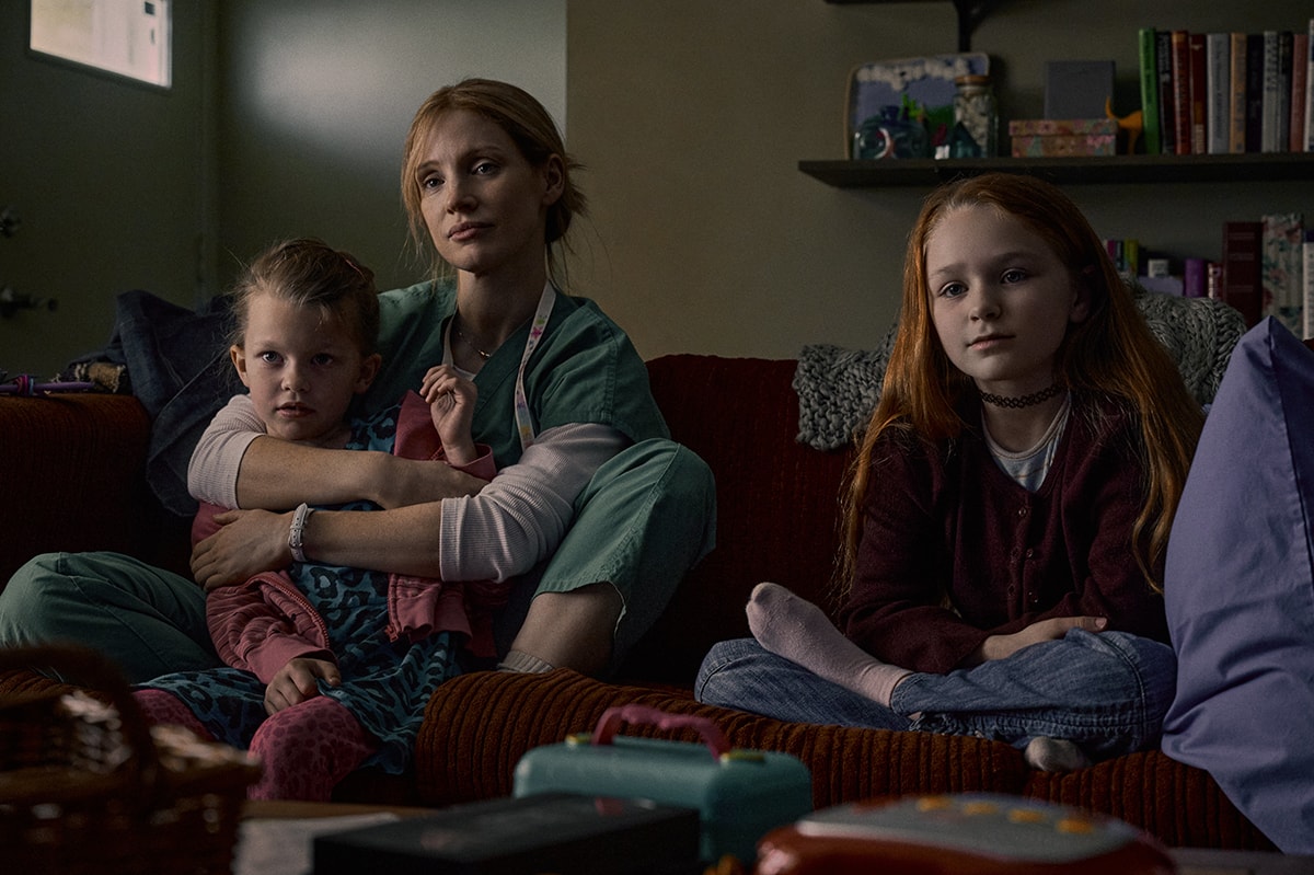 Jessica Chastain portrays Amy Loughren, a devoted nurse and single mother grappling with a serious heart condition in Netflix’s The Good Nurse