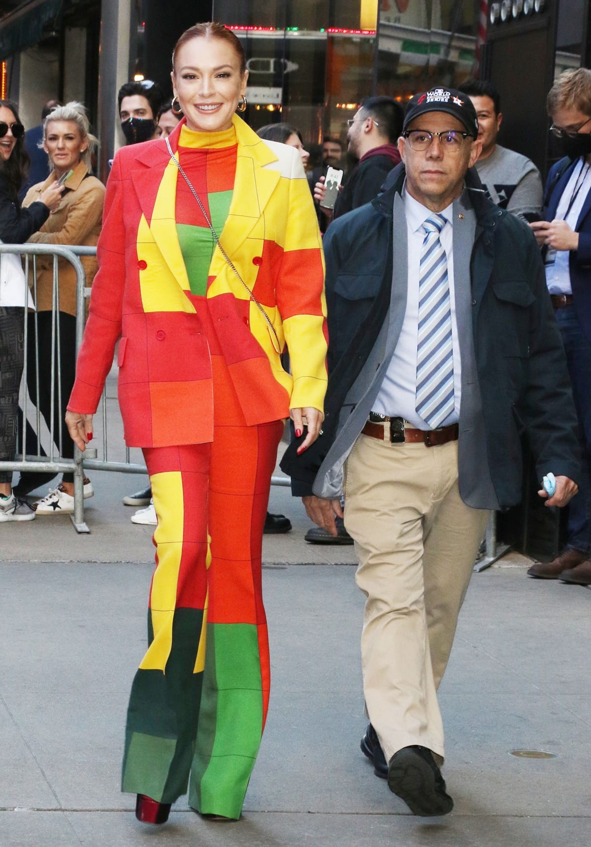 Lindsay Lohan in an Akris color-blocked suit and Giuseppe Zanotti heels for a taping of "Good Morning America"