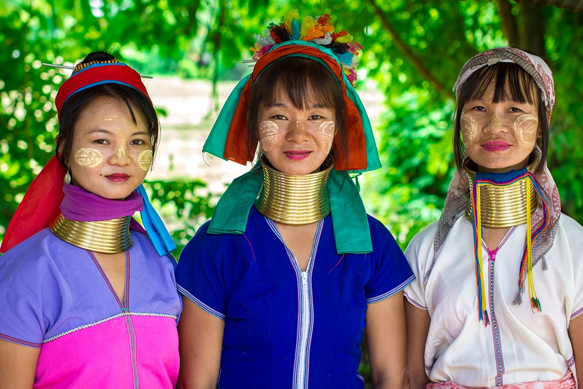 Women of the Kayan ethnic group wear traditional brass neck rings—a cultural expression of beauty and identity that has inspired modern interpretations of permanent jewelry