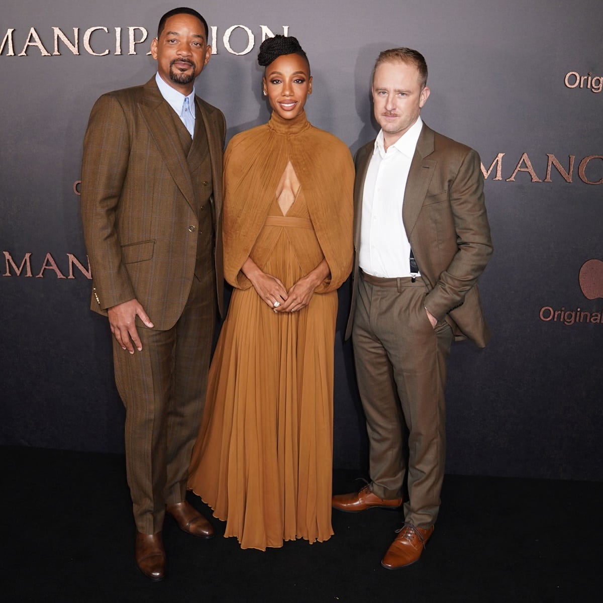 Will Smith in Dolce Gabbana, Charmaine Bingwa in Cong Tri, and Ben Foster in Brioni for the premiere of Emancipation held at Regency Village Theatre in Los Angeles