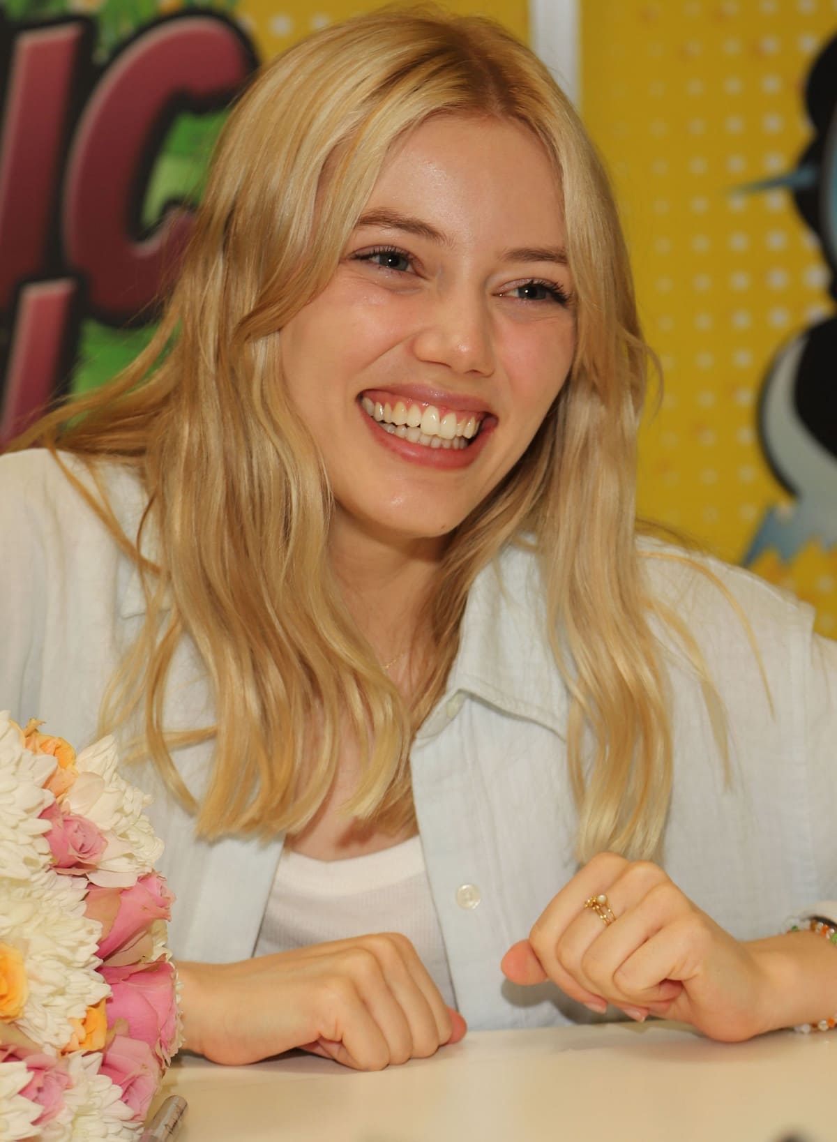 Grace Van Dien beams with joy while meeting fans at German Comic Con, held at Westfalenhallen in Dortmund, Germany, on July 15, 2022