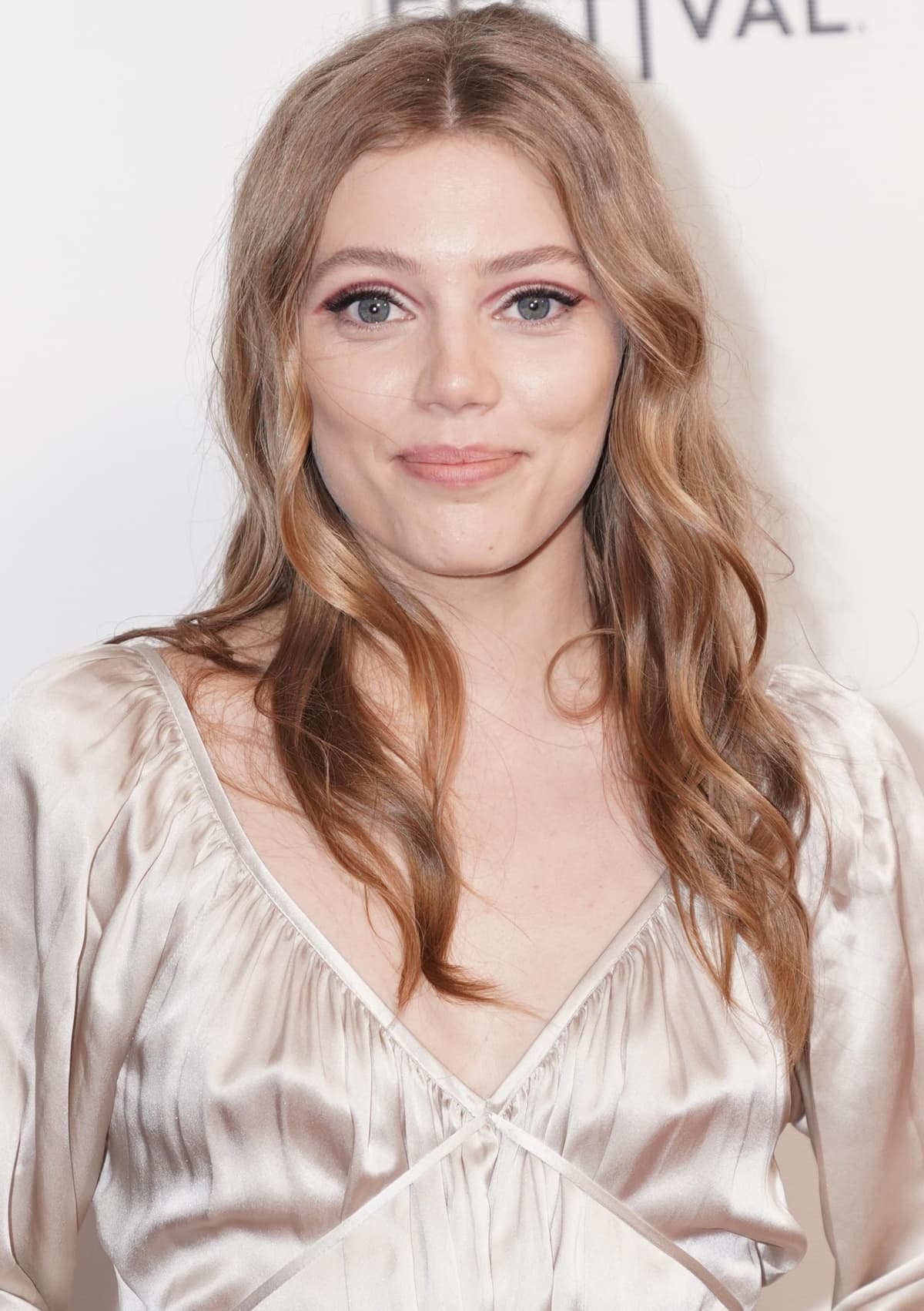 Grace Van Dien glows in a champagne satin dress at the world premiere of Charlie Says during the 2019 Tribeca Film Festival on May 2, 2019