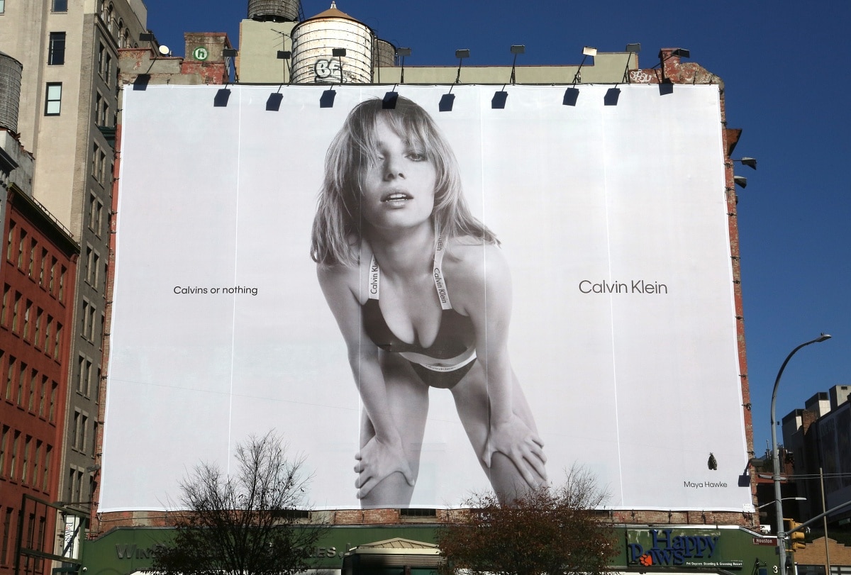 A massive Calvin Klein billboard in SoHo, New York, featuring Maya Hawke in the brand’s “Calvins or nothing” campaign — blending minimalist allure with bold 1990s nostalgia