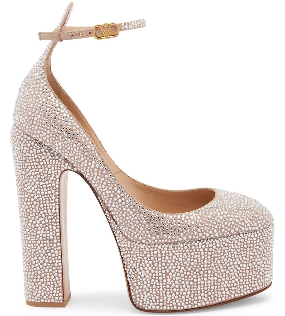 Crafted in Italy, these Valentino Garavani shoes feature six-inch block heels and almost three-inch platforms