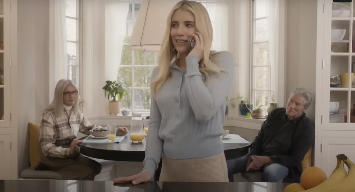 Emma Roberts appears as Michelle in a scene from Maybe I Do, as family tensions quietly unfold in the background