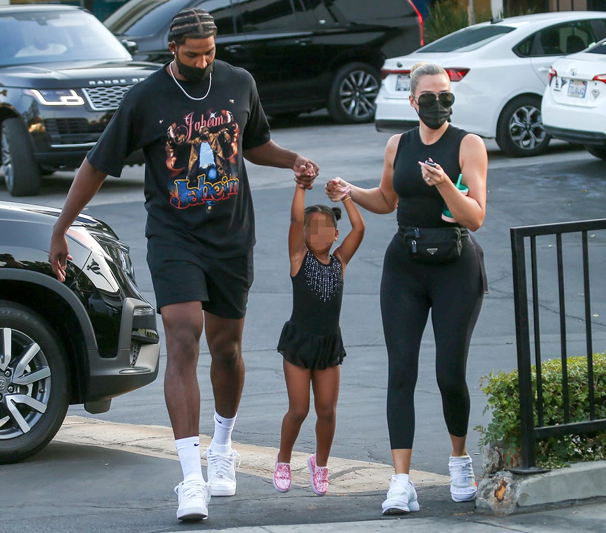 Tristan Thompson, who shares daughter True and a son with Khloé Kardashian, is seen walking with their daughter during a family outing in Los Angeles