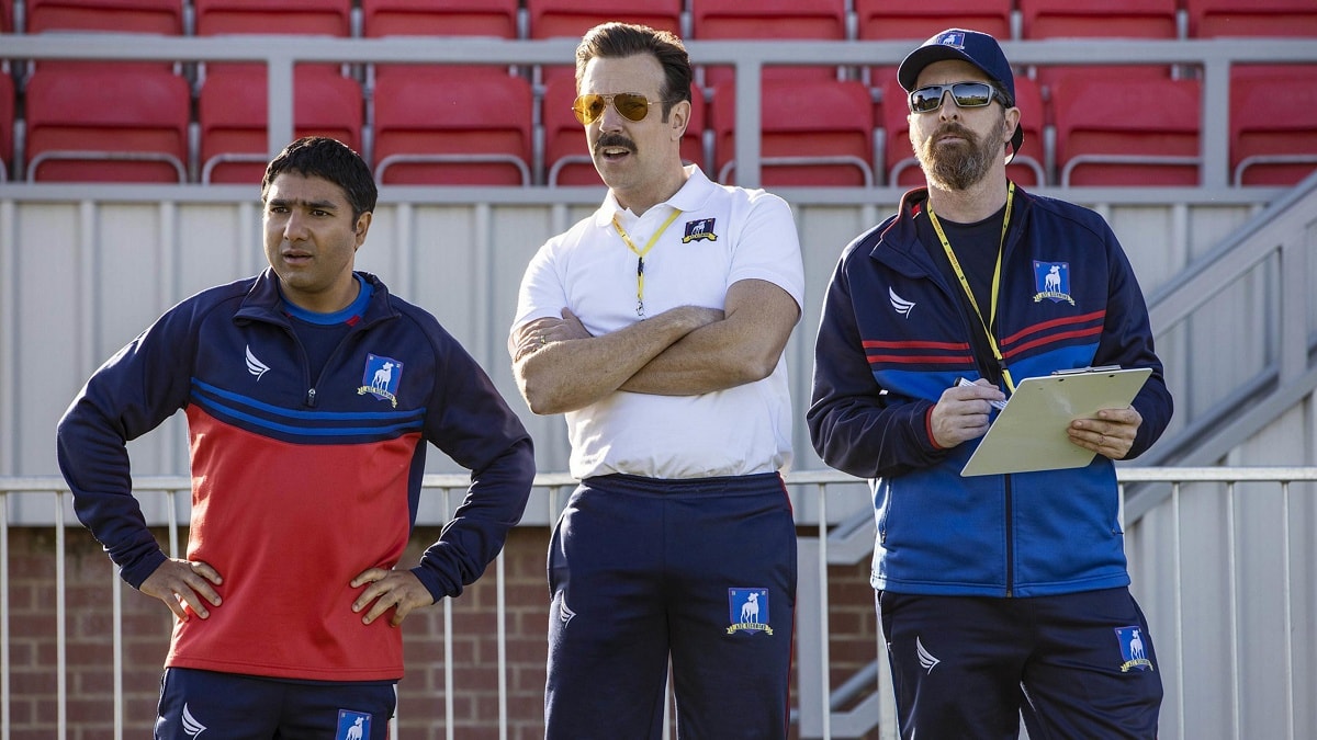 Nick Mohammed as Nathan Shelley, Jason Sudeikis as Ted Lasso, and Brendan Hunt as Coach Beard in the sports comedy-drama television series Ted Lasso