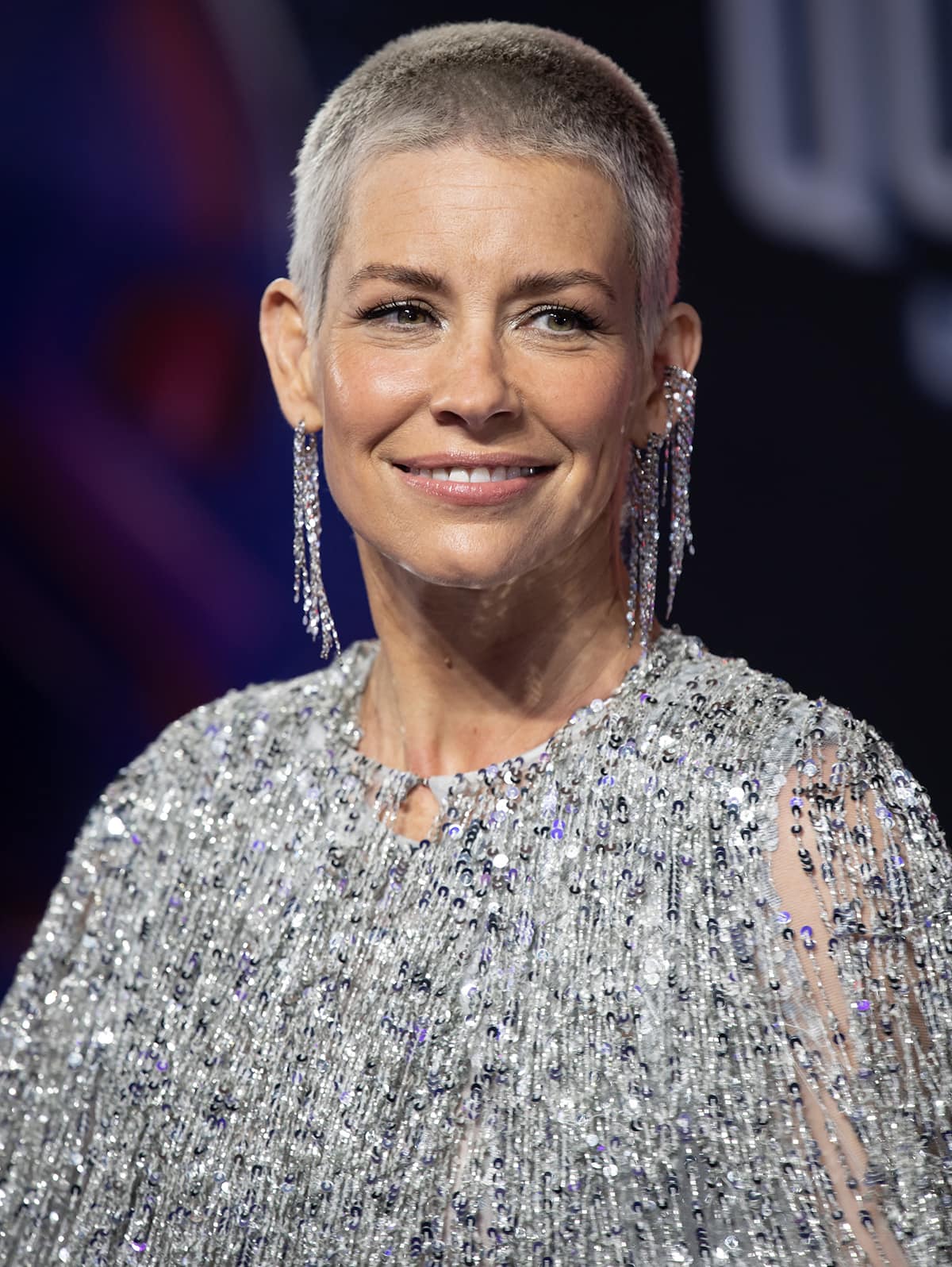 Evangeline Lilly debuts her shaved haircut, which is a result of minimizing bleaching damage while filming South of Heaven