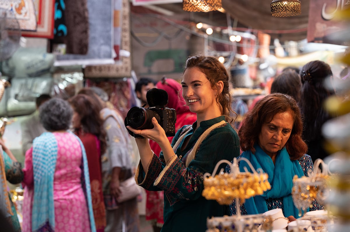 Lily James is a dating app addict and filmmaker in What's Love Got to Do with It?