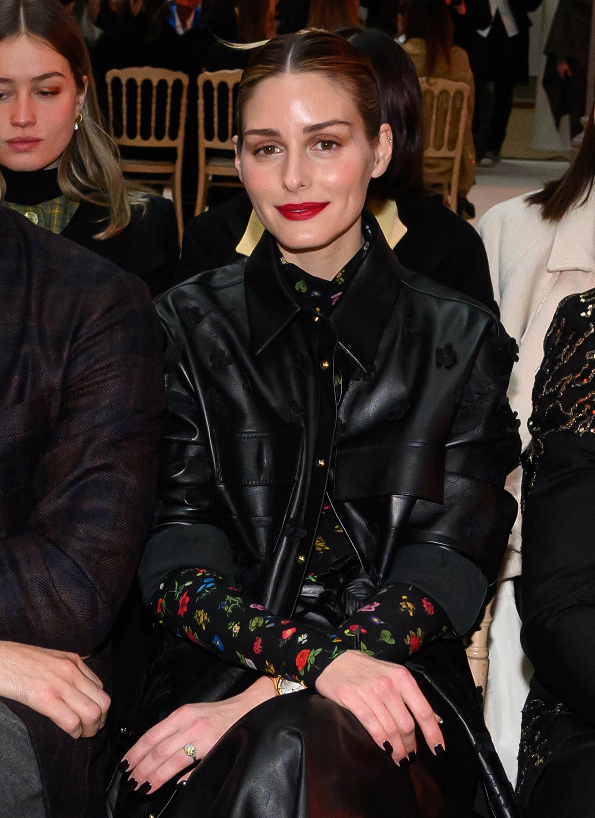 Elie Saab wears minimal jewelry and teams her leather look with a floral-printed top by Max Co.