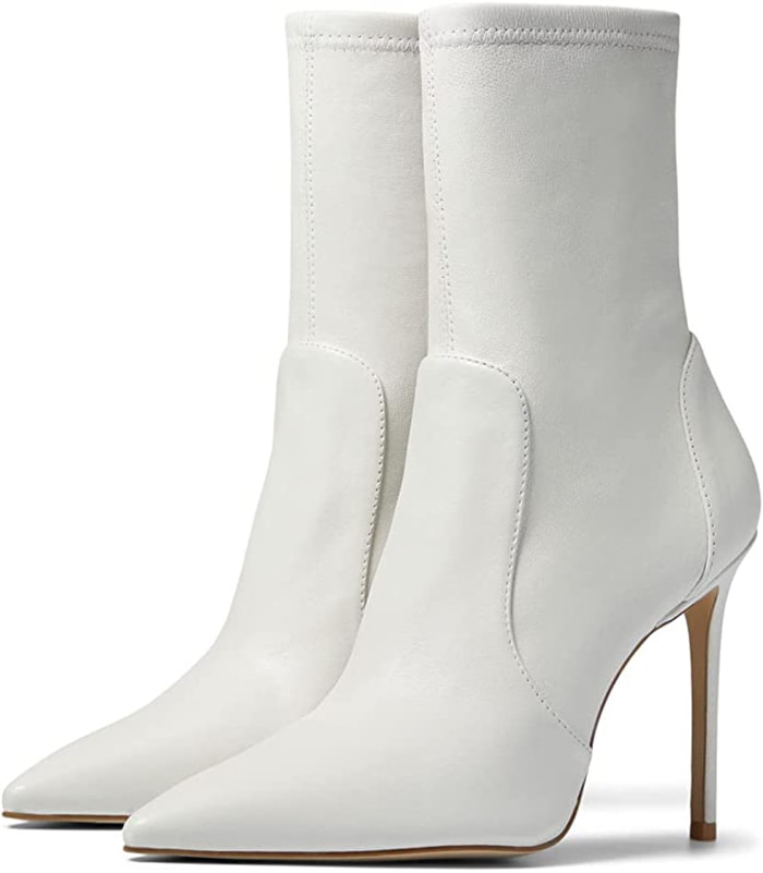 Stuart Weitzman's ‘Stuart 100 Stretch’ sock booties boast the label's iconic flawless-fit sock bootie construction with sharp pointy toes and stiletto heels