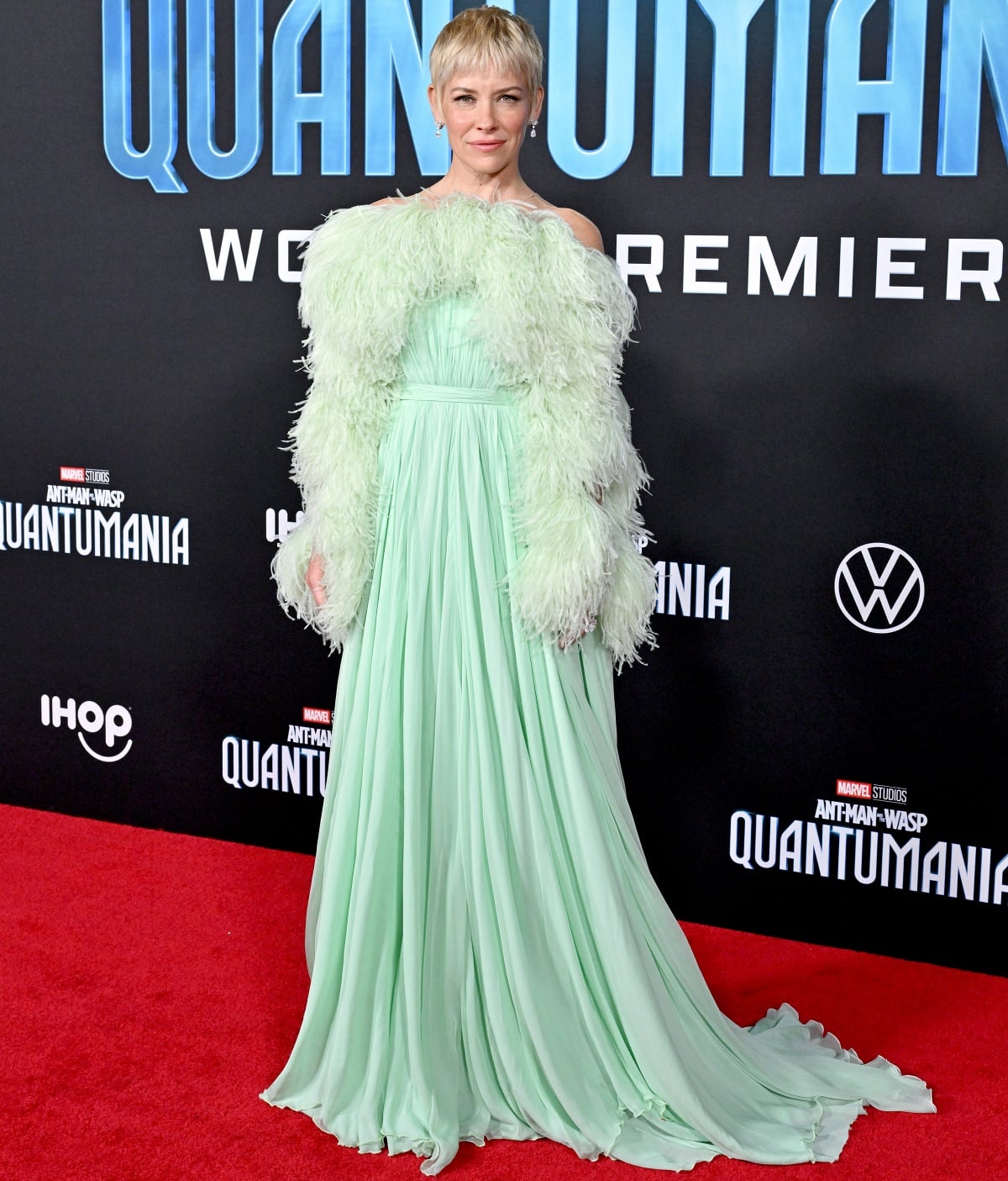 Evangeline Lilly turned heads in a mint-green Giambattista Valli Haute Couture gown with pleated chiffon and feathered accents at the Quantumania premiere