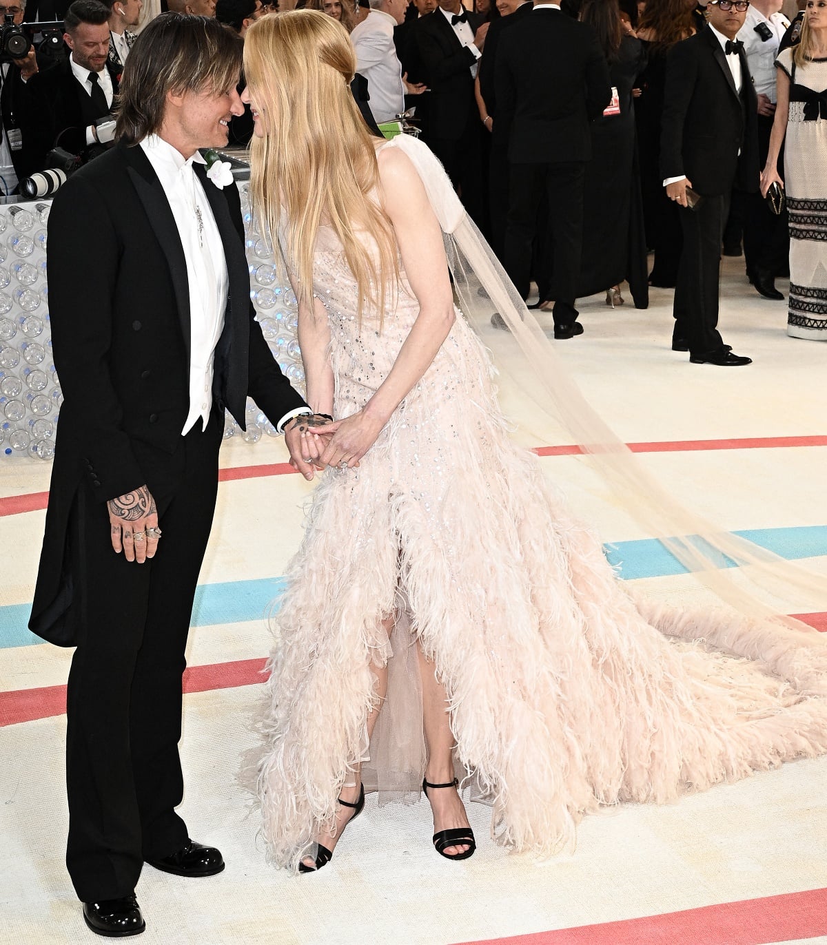 Keith Urban complemented her look in a classic black tuxedo with glossy dress shoes at the 2023 Met Gala in New York City