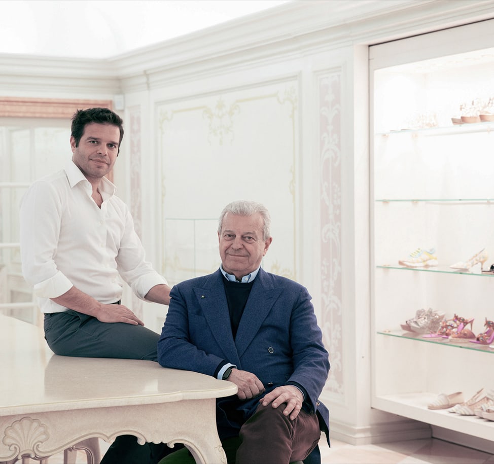 Edoardo Caovilla (L), son of Rene Fernando (R), is Rene Caovilla's third-generation creative director and COO