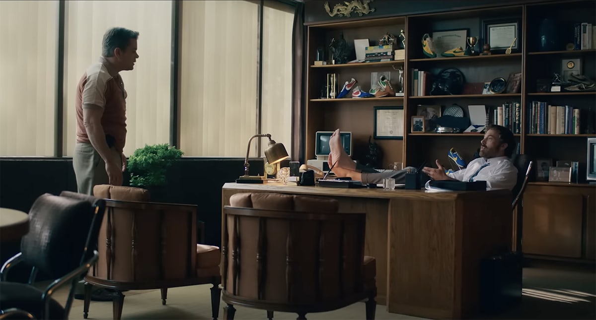 Matt Damon and Ben Affleck share an intense conversation in a pivotal scene from Air, showcasing the tension behind the creation of the iconic Air Jordan brand