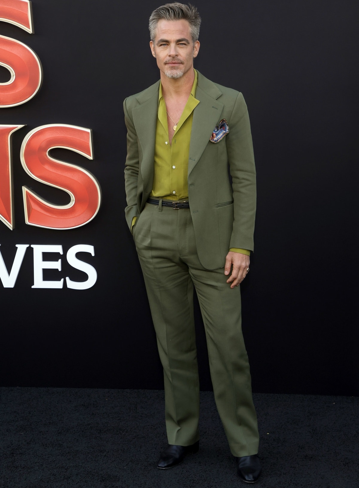 Chris Pine looked handsome in his dark green suit at the premiere of Dungeons Dragons: Honor Among Thieves