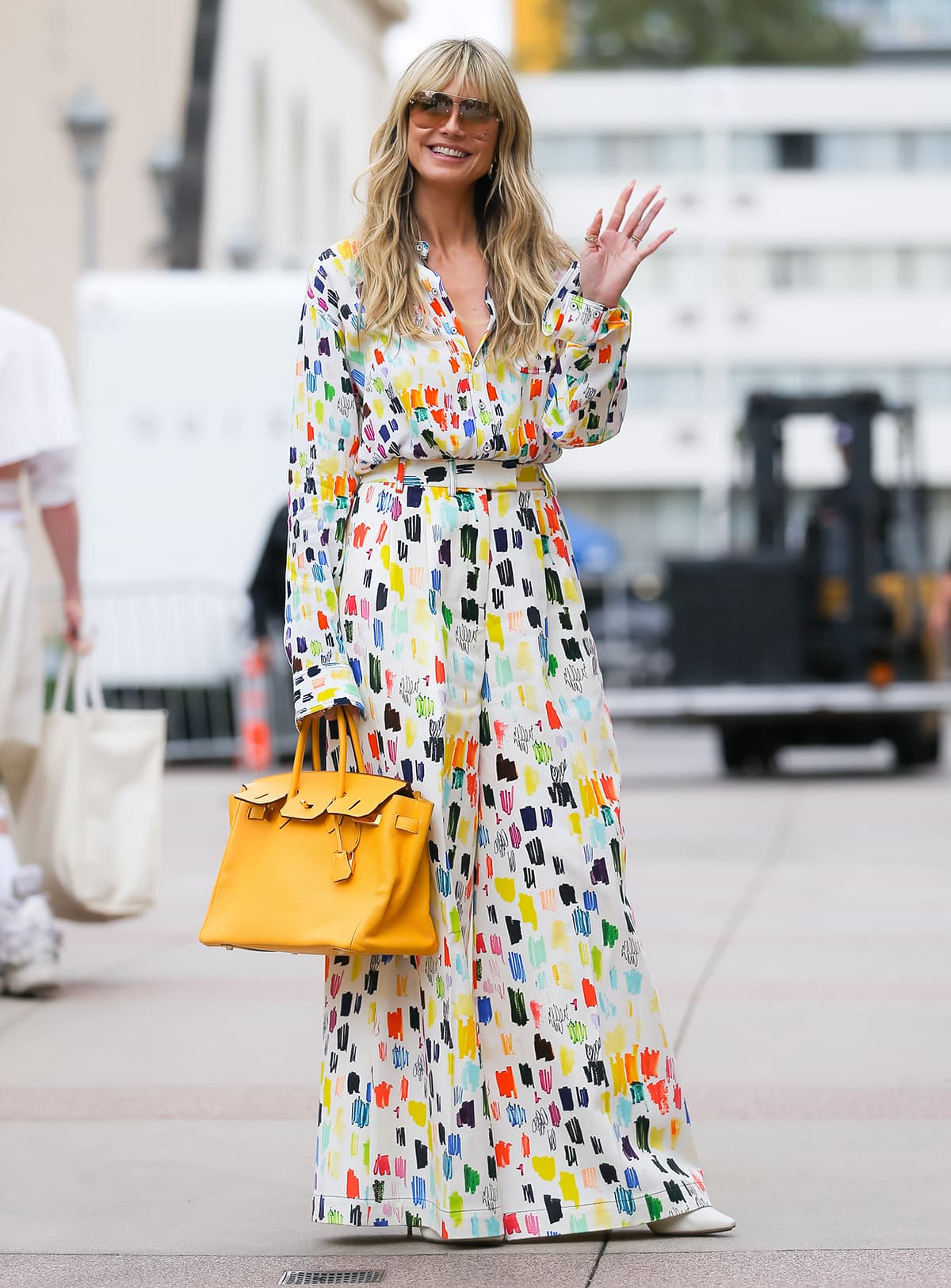 Heidi Klum outside America's Got Talent studio in Pasadena, California, in Christopher John Rogers' Marker Test shirt and wide-leg pants