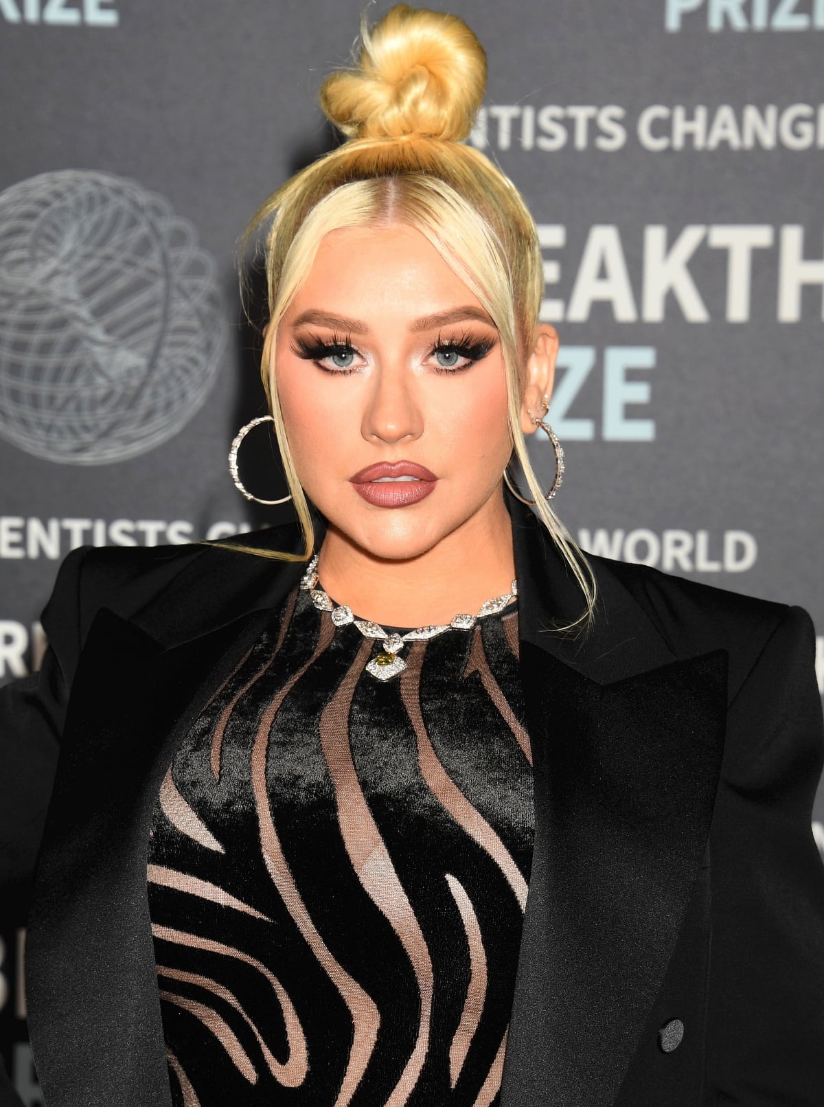 Christina Aguilera wore diamond jewels to add some sparkle to her outfit