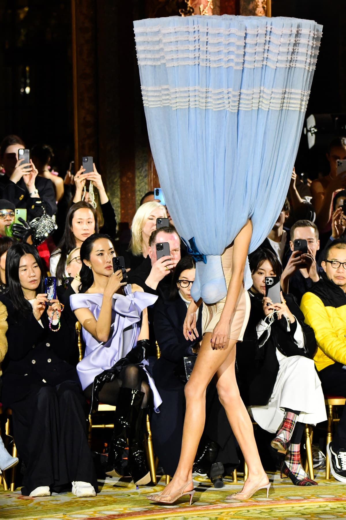 Viktor Rolf's spring 2023 couture collection, presented at Paris Fashion Week, defied gravity with its surreal and dreamlike designs and featured floating dresses and dramatic ballgowns that were turned upside down and inside out
