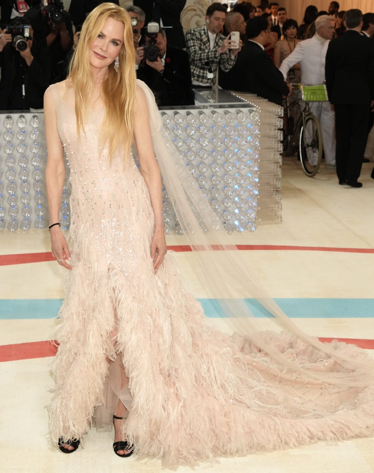 Nicole Kidman wearing a Chanel Haute Couture gown from circa 2004 paired with Harry Winston Cluster diamond chandelier earrings and a matching sparkling cluster diamond ring at the 2023 Met Gala with the theme Karl Lagerfeld: A Line of Beauty, held at the Metropolitan Museum of Art in New York City on May 1, 2023