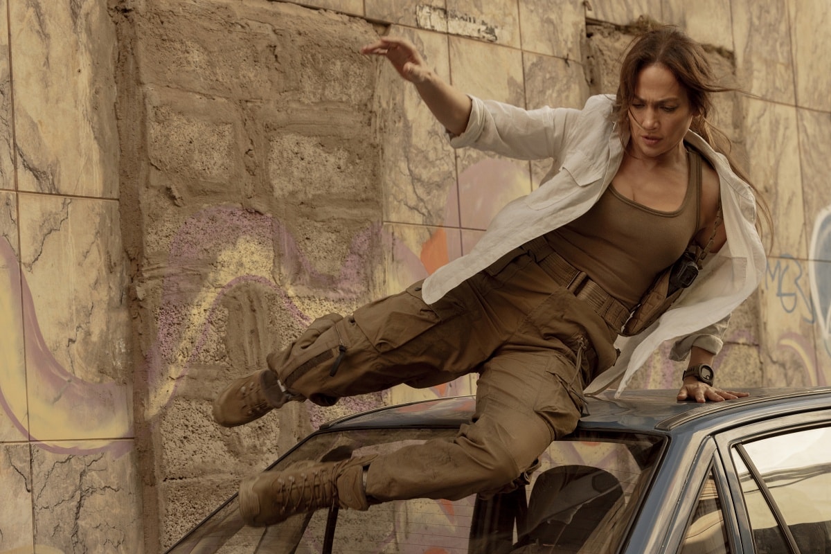 Jennifer Lopez performs her own stunts in The Mother, leaping into action in combat boots and cargo pants that highlight her transformation into a battle-hardened protector