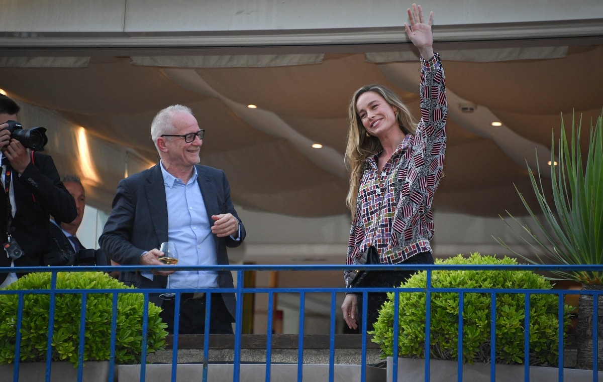 Brie Larson in a Chanel Pre-Fall 2023 look with festival chief Thierry Frémaux at the jury dinner ahead of the 76th Cannes Film Festival