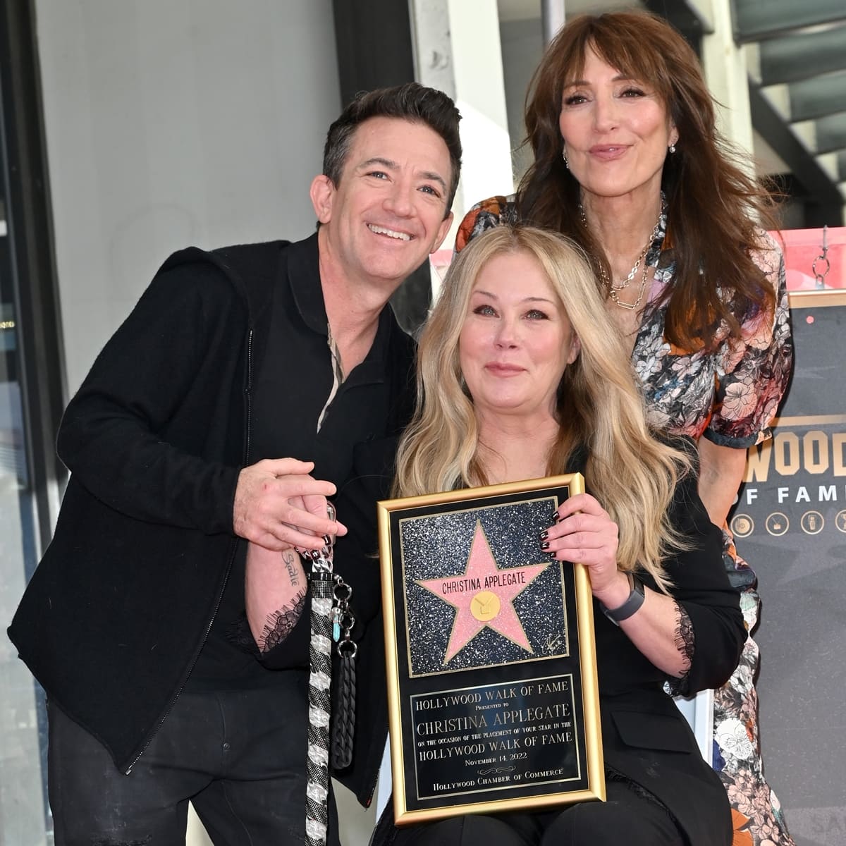 David Faustino and Katey Sagal proudly support Christina Applegate as she receives her star on the Hollywood Walk of Fame on November 14, 2022, marking a milestone in her decades-long career